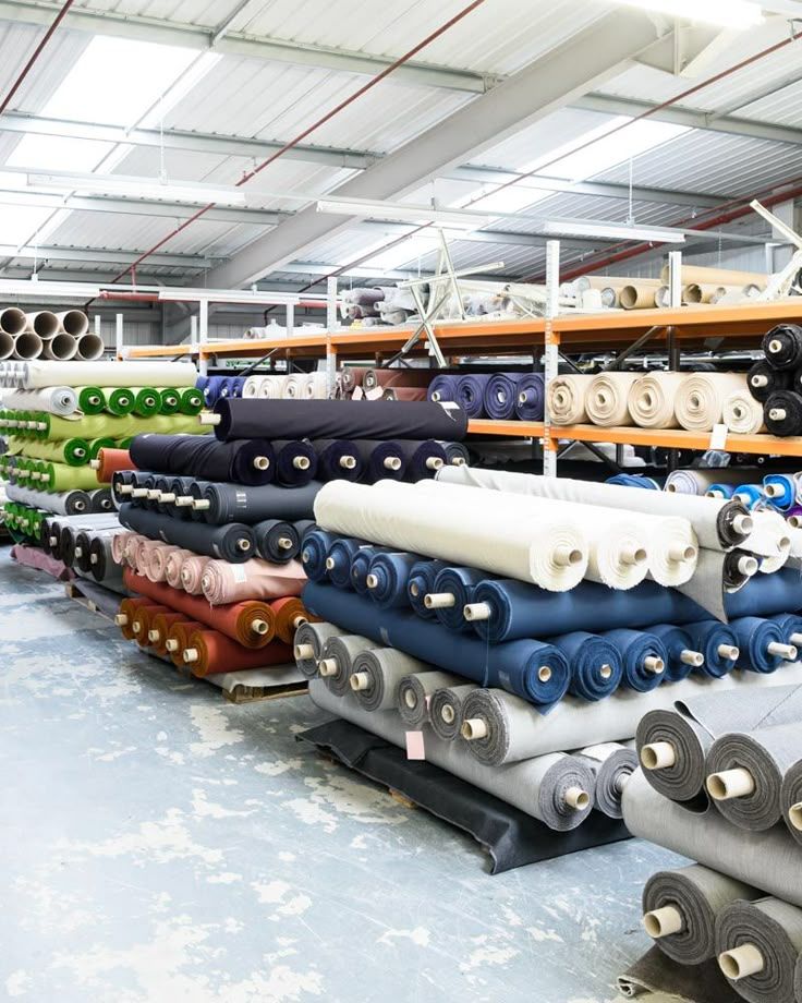 Rolls of fabric stored at the Vinayak Garments facility